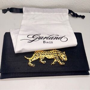 Garland famous clutch purse handbag with crystal jaguar.  Perfect condition